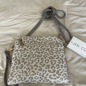 Crossbody Jen & Co in Grey Animal Print on White Background